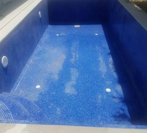 The real cost of owning a swimming pool